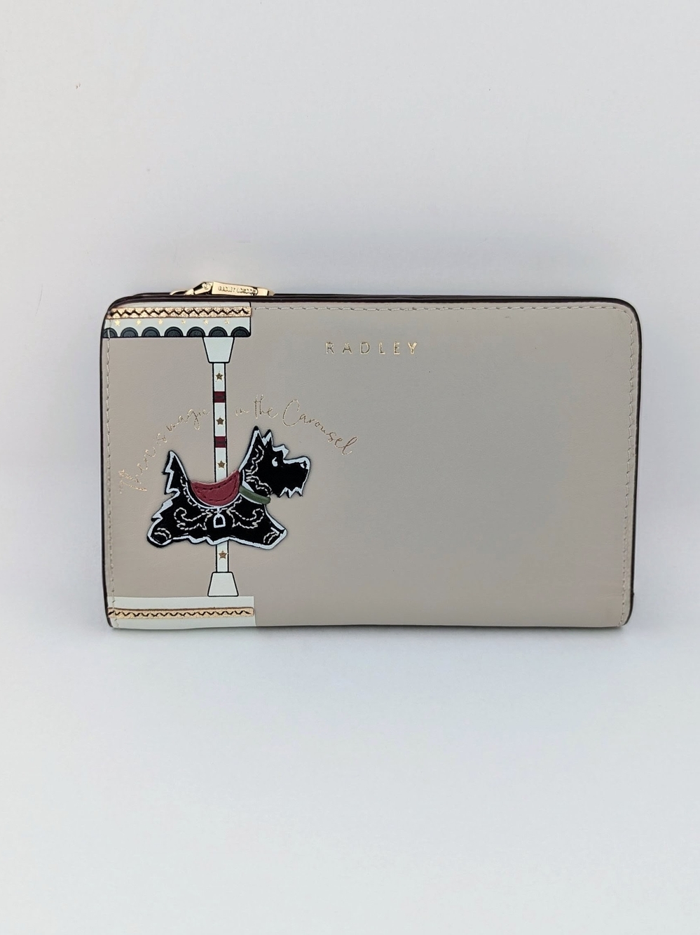 Radley London "There Is Magic In The Carousel" Leather Light Beige Bifold Wallet
